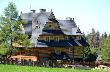 Wooden house in the mountains (The Tatras in Poland) - obrazy, fototapety, plakaty