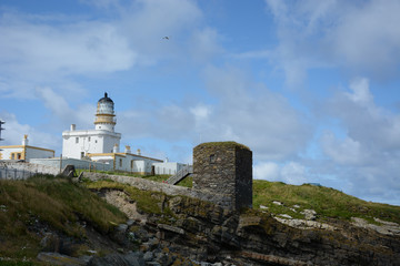 Fototapeta na wymiar Lighthouse and winehouse