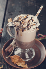 Autumn background with hot coffee cup.