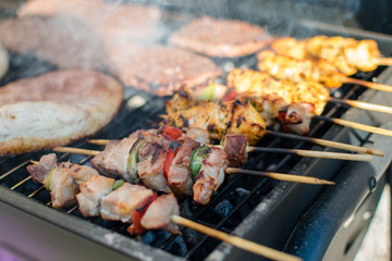 Meat cooking on barbecue