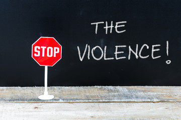 STOP THE VIOLENCE message written on chalkboard