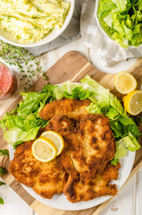 Delicious schnitzel with salad