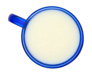 Fototapeta na wymiar Mug of buttermilk on a white background