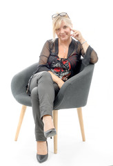 Fototapeta premium Portrait of mature smiling blond woman