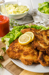 Delicious schnitzel with salad