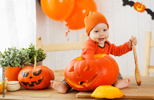 happy  baby with pumpkin for Halloween
