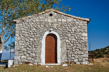 Fototapeta na wymiar Orthodox stone chapel on the island of Lefkada.