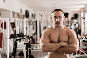 Fototapeta na wymiar Portrait of man in gym, ready for training.