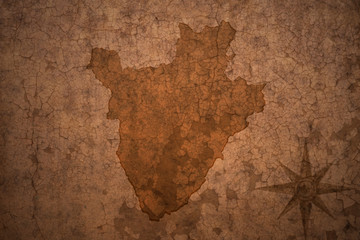 burundi map on a old vintage crack paper background
