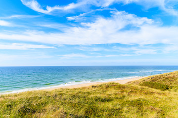 Fototapeta na wymiar View of beautiful beach and sand dune near Wenningstedt village, Sylt island, Germany