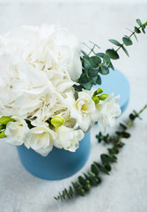Bouquet of white hydrangeas in box