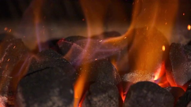 Charcoal fire is burning in slow motion