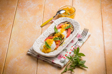 caprese with mozzarella tomato  grilled eggplant and pepper crea