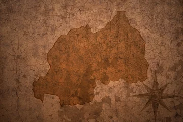 Abwaschbare Fototapete Alte schmutzige strukturierte Wand Ruanda-Karte auf einem alten Vintage-Crack-Papierhintergrund