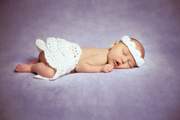 Lovely Newborn Girl Is Sleeping
