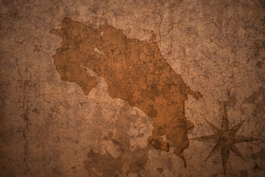 costa rica map on a old vintage crack paper background