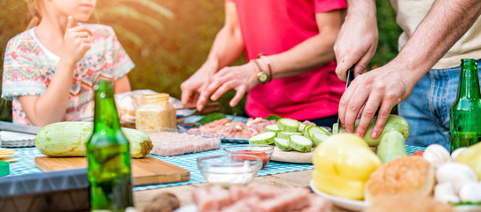 Couple preparing food for barbecue