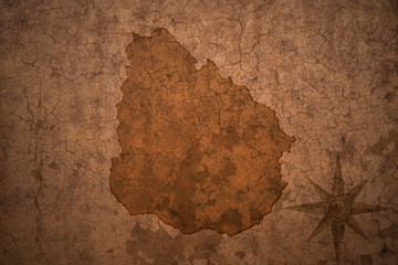 uruguay map on a old vintage crack paper background