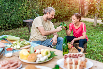 Couple Making A Toast With Beer