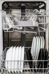 Clean plates and glasses in dishwasher machine