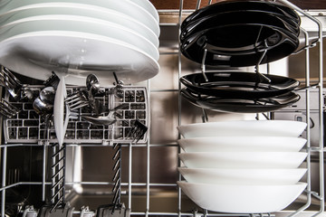 Dishes after cleaning  in dishwasher machine