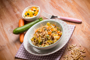 rice with mixed vegetables and pine nuts