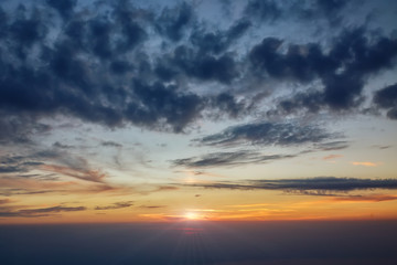 Naklejka na ściany i meble Sunset at an altitude of 3 km above the ground