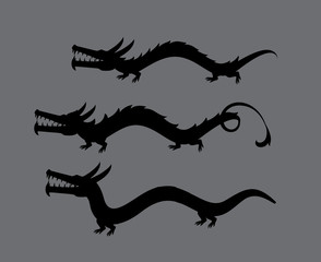 Obraz premium Dragons Silhouettes