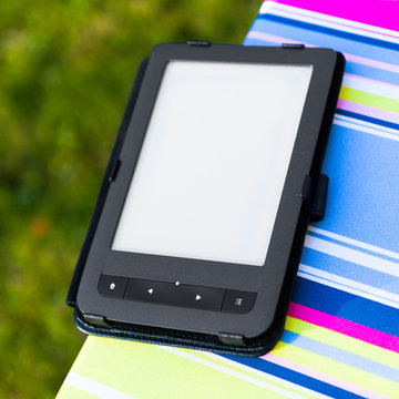 e-Book reader on the chair, closeup view