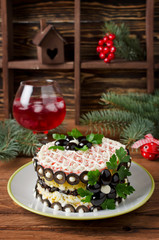 Salad with crab sticks, cheese, egg and prunes