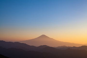 Beautiful sunrise time of Mountain Fuji in autumn season seen from Mountain Takayama , Shizuoka prefecture