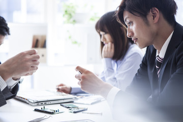 Fototapeta premium Businessman is looking at the foundation of the computer