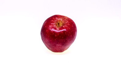 Fresh red apple isolated on white background.