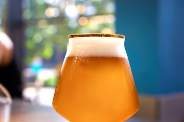 cold beer glass on bar or pub desk