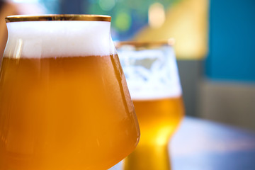 cold beer glass on bar or pub desk