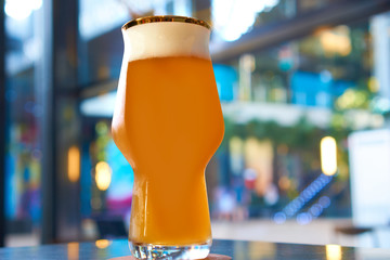 cold glass of beer in pub