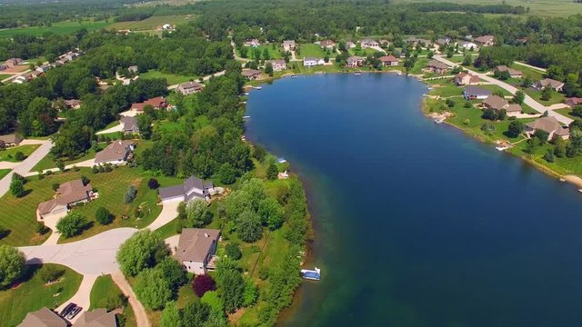 Rural Affluent Suburb on Beautiful Man-Made Lake, Aerial View.
