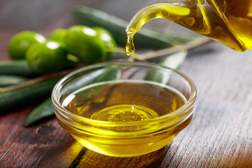 Olive oil and olive twig