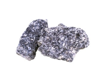 Granite stones in front of a single stone composition, isolated over the white background