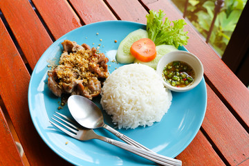 Pork stir-fried with garlic and peppercorns with rice