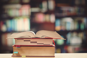 books on the desk in the library