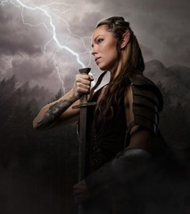 Female holding sword on lightning background.