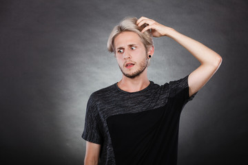 Young man thinking seek a solution