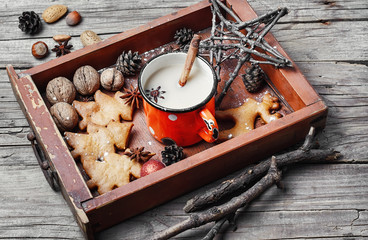Cup of coffee and christmas symbol in wooden box