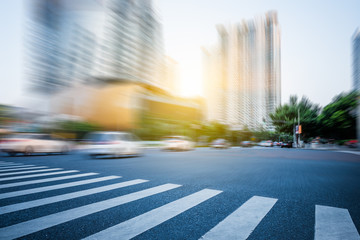 Shanghai street view with cityscape in background.