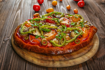 Tasty homemade pizza on table