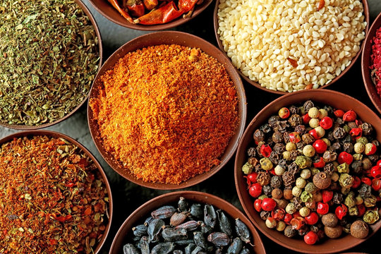 Different spices in bowls, closeup