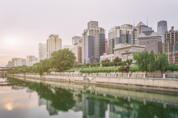 Fototapeta na wymiar Downtown City skyline along the River in China.