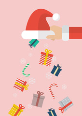 Santa hand holding Santa hat with christmas gift box