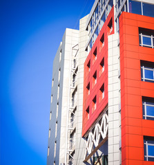 facade of the house red in the high-tech style